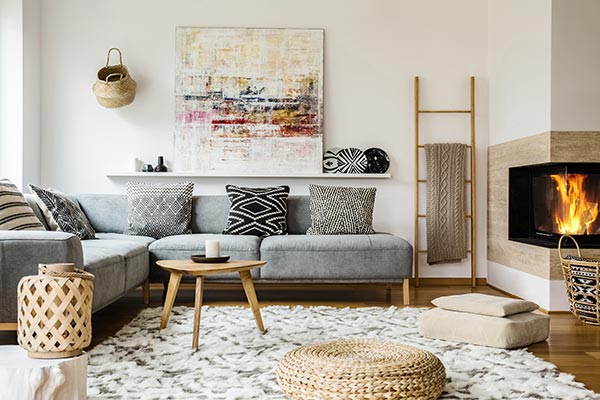 wooden table next grey corner settee